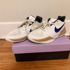 Nike White Sneakers with Blue Swoosh and Tan Accents